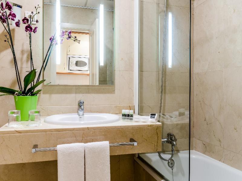 Exe Suites 33 Madri Quarto foto